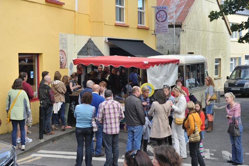 Visitors at outdoor food stalls during Dingle Food Festival